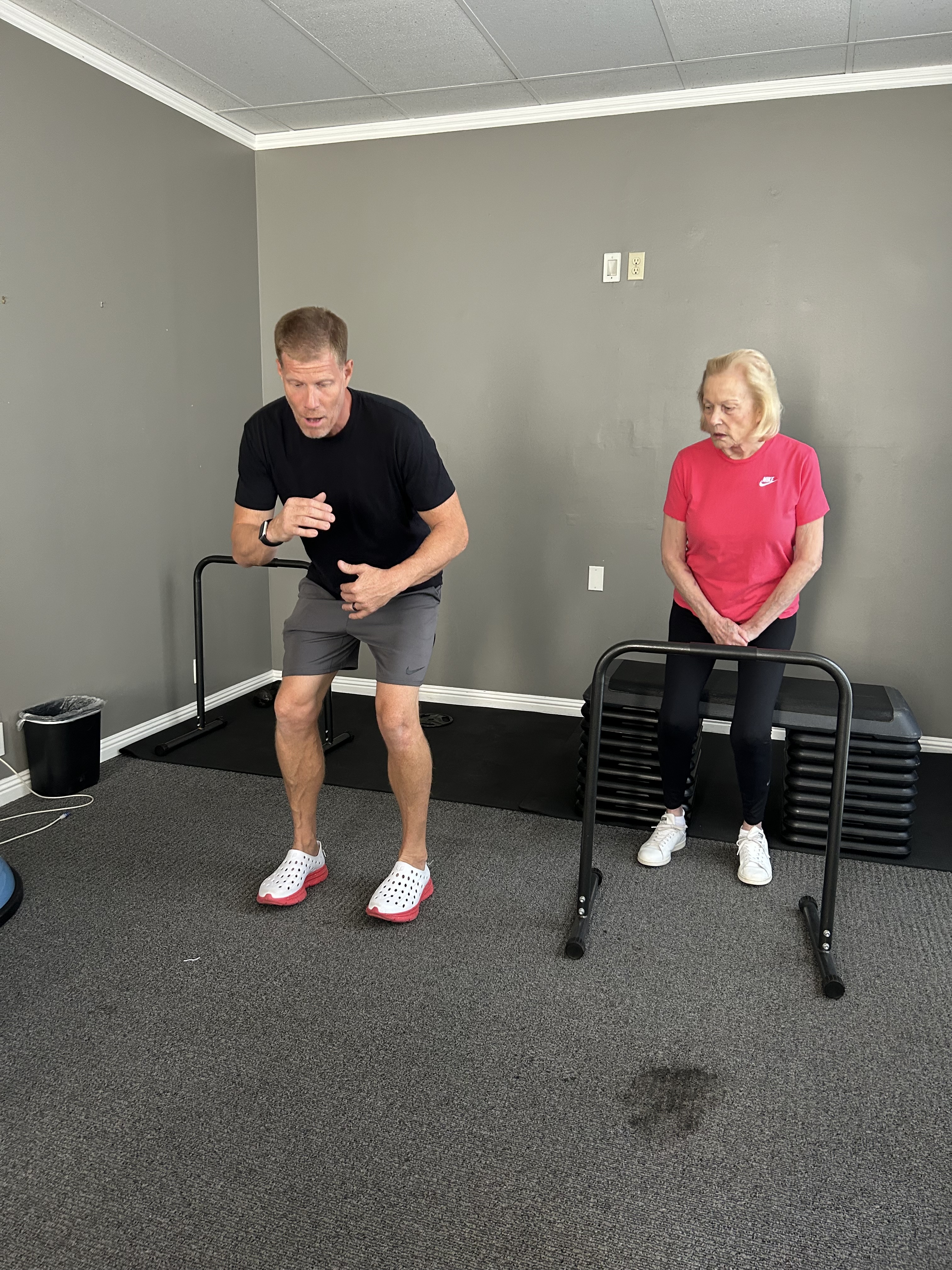 Brennan coaching a client through targeted resistance work